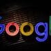 Colorful Google neon sign on dark background