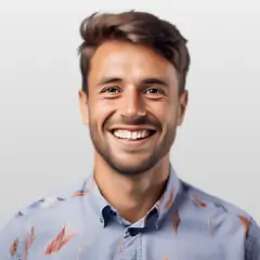 Smiling man in patterned blue shirt portrait